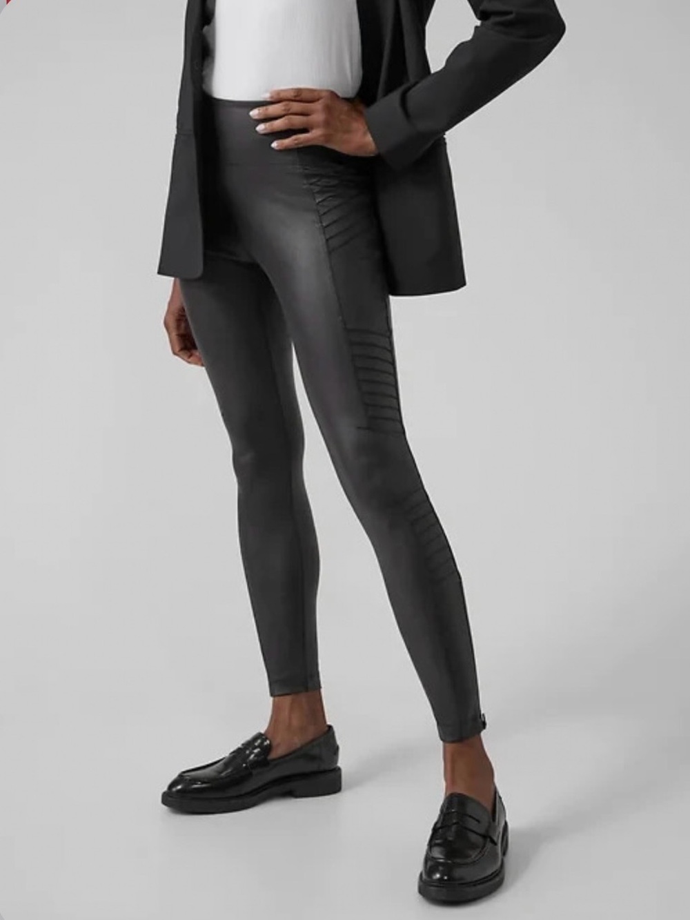 Athleta Delaney moto tight size large 
Sleek Black Moto-Detail Ponte Leggings